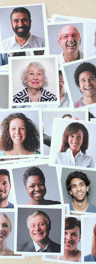 stack of polaroid portraits of different people